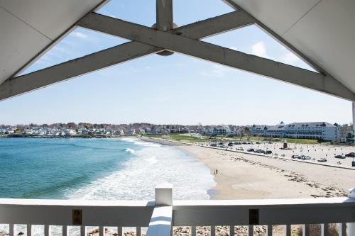a view of the beach from a window at Union Bluff Hotel & Meeting House in York Beach
