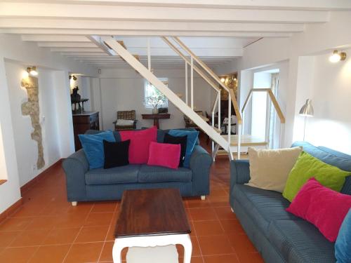 a living room with two couches and a table at Gold - Private Pool - 18 Guests - Albufeira in Albufeira