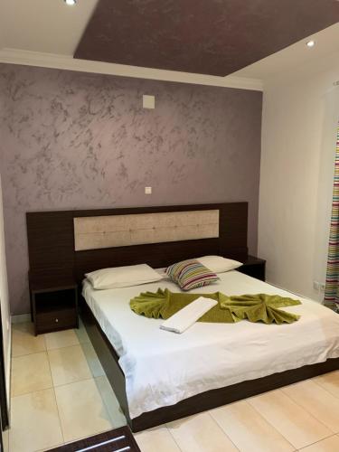 Postel nebo postele na pokoji v ubytování Capital Hôtel