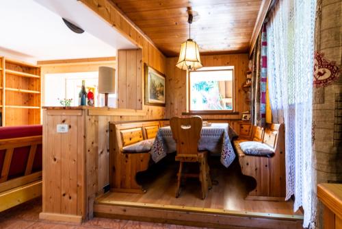 Posezení v ubytování Casa dal Ri'
