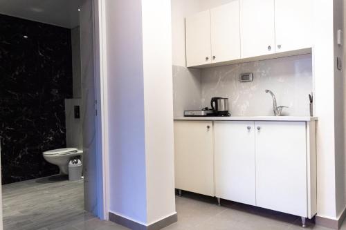 Virtuvė arba virtuvėlė apgyvendinimo įstaigoje Amwaj Apartments