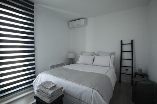 A bed or beds in a room at Leoforos 28is Oktovriou