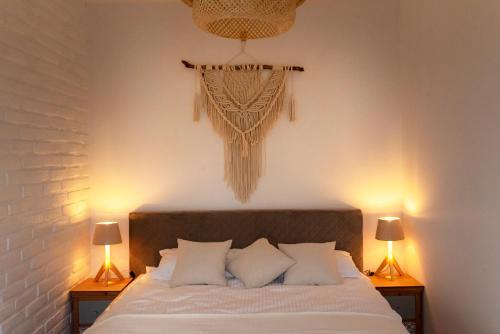 Postel nebo postele na pokoji v ubytování Eco apartament Nałęczów
