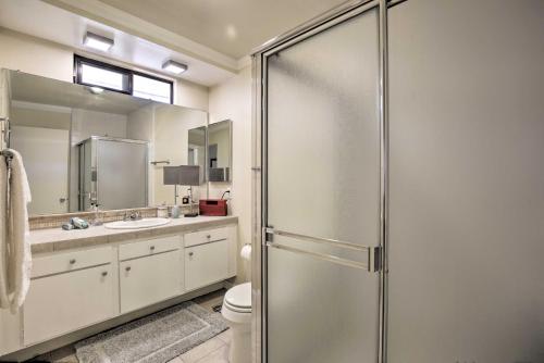 a bathroom with a shower and a toilet and a sink at Condo with Mountain Views-3mi to DT Palm Springs in Palm Springs