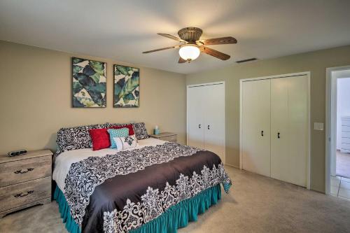 a bedroom with a bed and a ceiling fan at Family Home with Boat Parking - 3 Mi to Lake Havasu! in Lake Havasu City