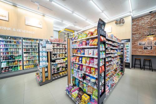 a store aisle in a grocery store at Lavalse Hotel in Busan