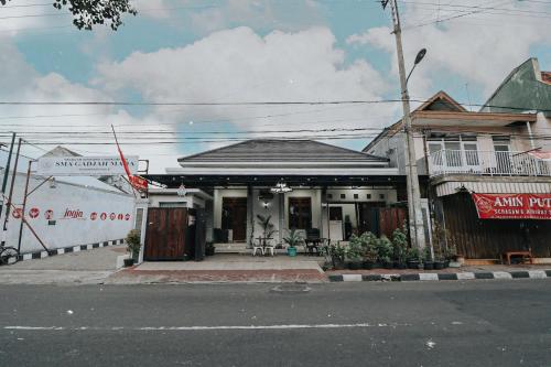 a building on the side of a street at Griya Suryo Wijilan in Yogyakarta