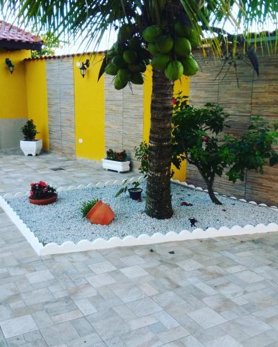 Κήπος έξω από το Vênus Apartamentos