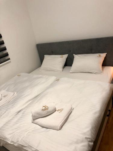 Ліжко або ліжка в номері AM Apartment