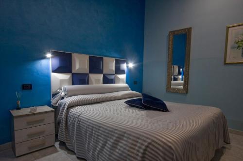 Ένα ή περισσότερα κρεβάτια σε δωμάτιο στο Hotel Il Gioiello