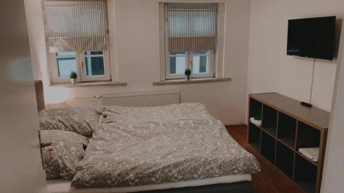 Ein Bett oder Betten in einem Zimmer der Unterkunft Stabwerk Goslar Altstadt