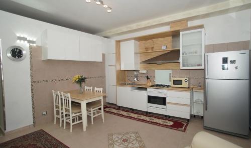 Kuchyň nebo kuchyňský kout v ubytování Sole e Luna OPEN SPACE for family