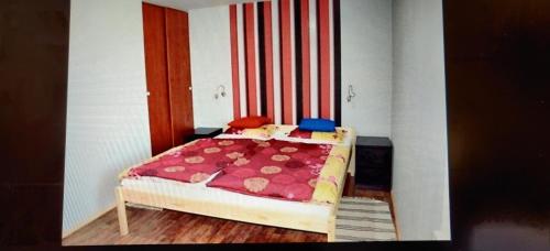 Posteľ alebo postele v izbe v ubytovaní Apartmány ELBA