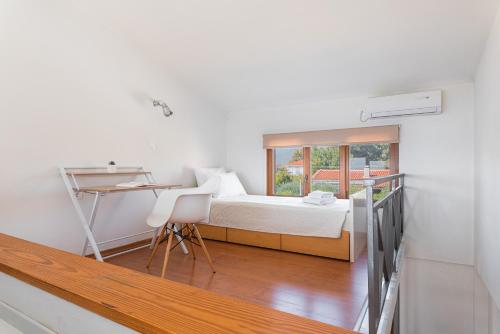 Ένα ή περισσότερα κρεβάτια σε δωμάτιο στο Naftilos Residences II