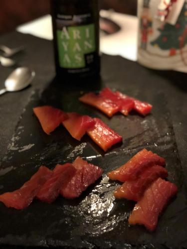 a bunch of chopped up bacon on a counter at El Bosque de La Anjana in Selores