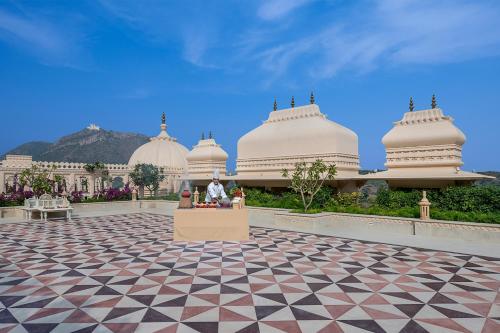 a view of a building with a tiled floor at Aurika, Udaipur - Luxury by Lemon Tree Hotels in Udaipur