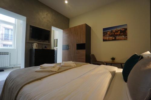 Кровать или кровати в номере Urban Lodge Belgrade