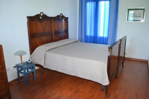 Postel nebo postele na pokoji v ubytování Torre del Po - locazione breve