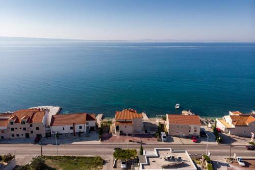 an aerial view of a town next to the ocean at Apartments Antonio - Podstrana, Split in Podstrana