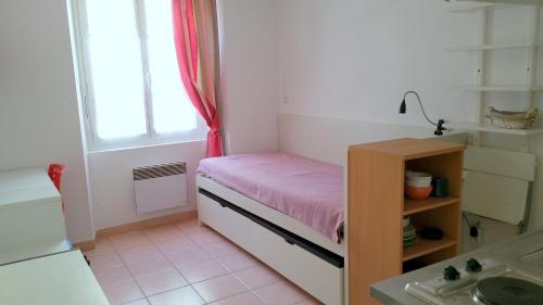 Кровать или кровати в номере Le Petit Saint Jean - Residadigne - Zeperfectplace