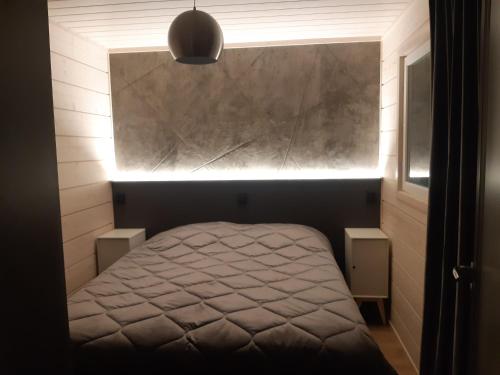 Postel nebo postele na pokoji v ubytování Louhi B