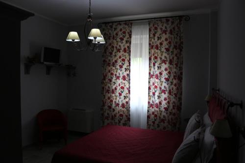 Ένα ή περισσότερα κρεβάτια σε δωμάτιο στο La Selva Incantata