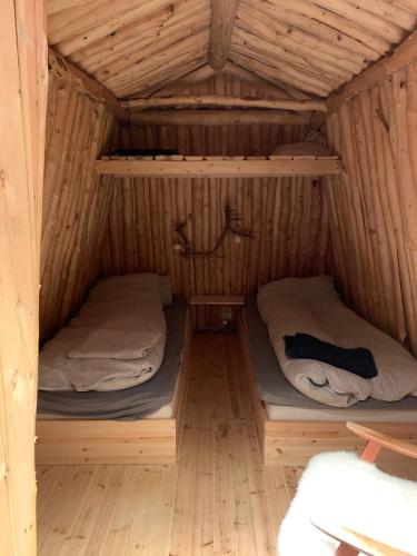 Llit o llits en una habitació de Modern turf house