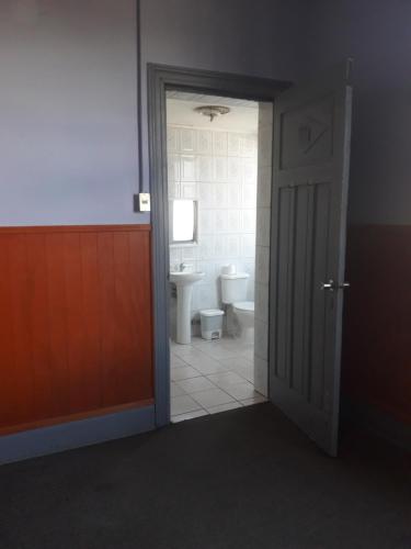 Ein Badezimmer in der Unterkunft Hostal Capricho de Carlitos