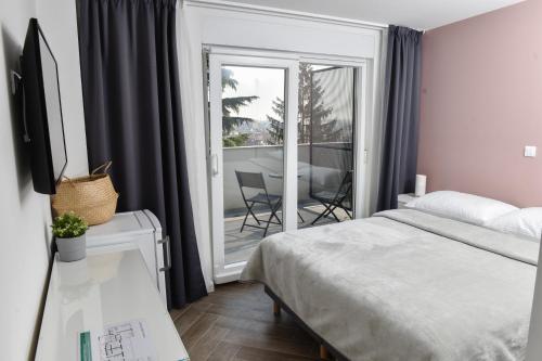 Ένα ή περισσότερα κρεβάτια σε δωμάτιο στο Rooms at Zajčeva 34