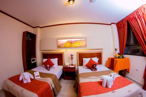 Ένα ή περισσότερα κρεβάτια σε δωμάτιο στο Hatun Samay Hotel