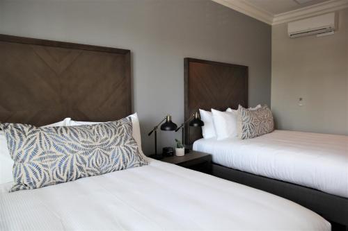 Una cama o camas en una habitación de Hotel Winters
