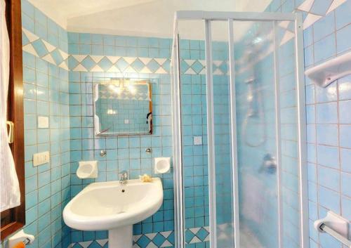 ห้องน้ำของ Residence Il Borgo di Porto Corallo