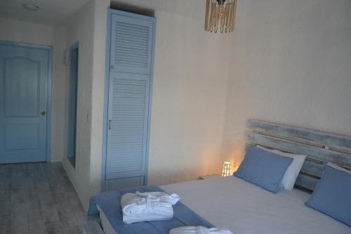Кровать или кровати в номере Thea Butik Hotel & Restaurant