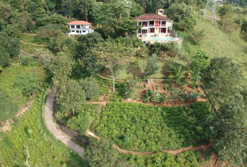 an aerial view of a house on a hill at Lotus Villa Kandy in Peradeniya