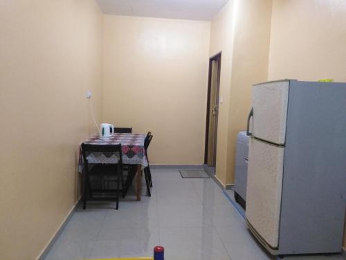 Kuchyň nebo kuchyňský kout v ubytování Homestay Teratak Umi Klang