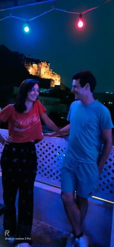 a man and a woman standing next to each other at Shivam Tourist Guest House in Būndi
