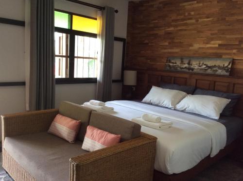 Кровать или кровати в номере Baan Yaimai Boutique Samui