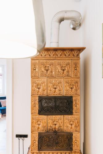 an old wooden chest of drawers with a pipe at #1 AUGSBURG Altstadtjuwel in Augsburg
