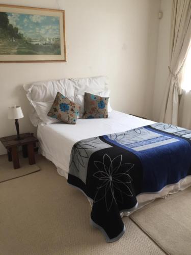 Letto o letti in una camera di Riverfront Homestay