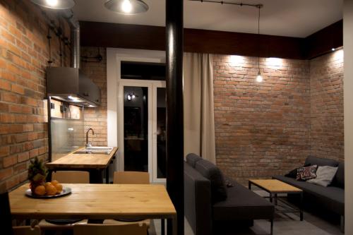 Kuchyň nebo kuchyňský kout v ubytování Apartamenty Folwark Boguszyn
