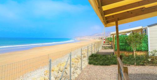 a view of the beach from a house at LOCA BEACH in Taghazout