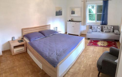 En eller flere senge i et værelse på FERIENWOHNUNG KIM SCHLADMING