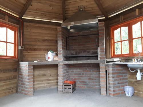 Kuchyň nebo kuchyňský kout v ubytování Cabañas Los Castaños Chovellén