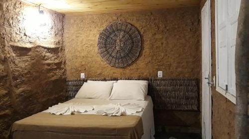 Postel nebo postele na pokoji v ubytování Casa do Sertão - Vila Aju