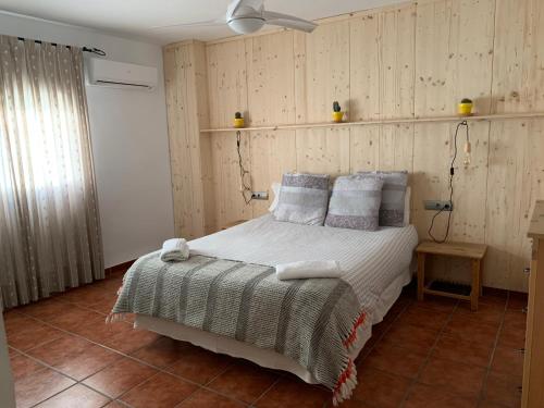 In Granada's Heart tesisinde bir odada yatak veya yataklar