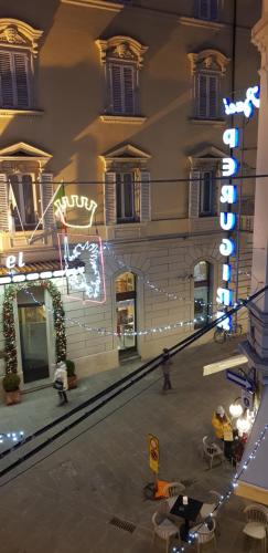 a view of a building with christmas lights at B&B Pierilu' in Grosseto