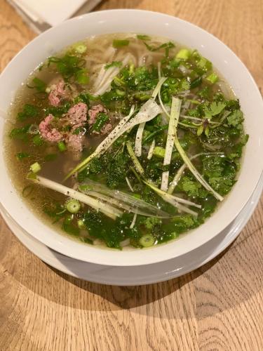 a bowl of soup sitting on a table at Gate 13 - Aurich Innenstadt in Aurich
