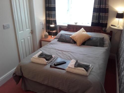 Katil atau katil-katil dalam bilik di Clumber House Hotel
