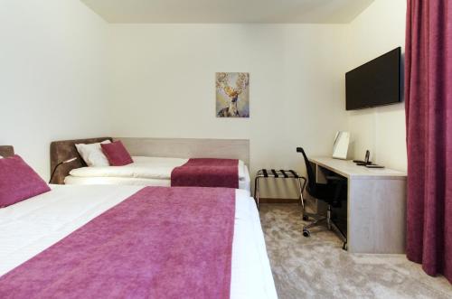 Ein Bett oder Betten in einem Zimmer der Unterkunft MVP apartment - Belgrade Waterfront