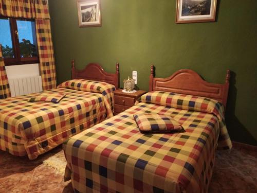 Un pat sau paturi într-o cameră la Casa La Huerta